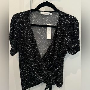 NWT black with white pattern wrap top